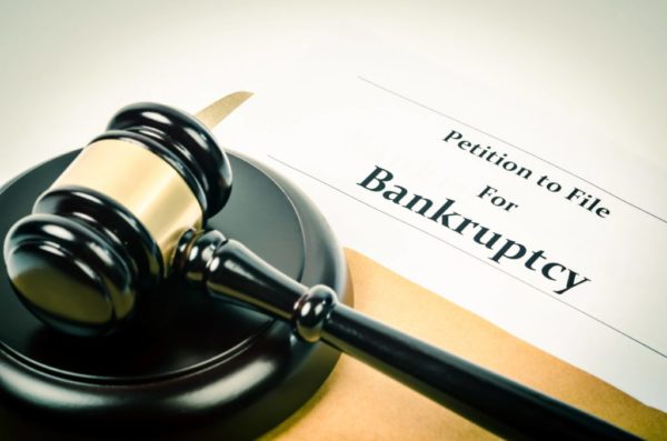 Gavel and petition to file bankruptcy document